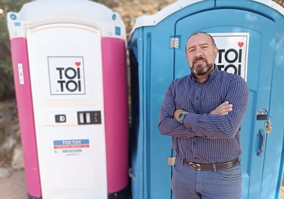 The councillor for trade in front of the new facilities.