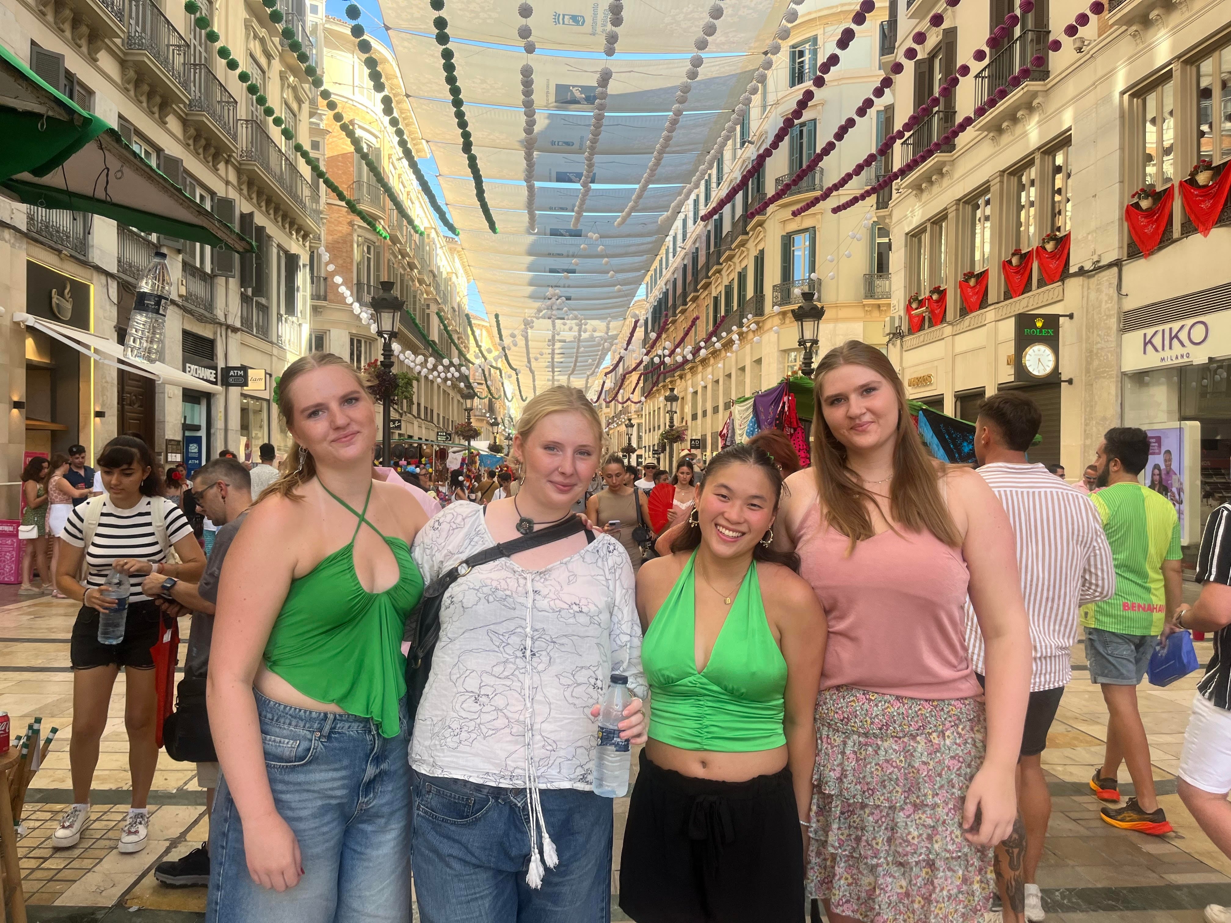 A group of Danish tourists celebrating the 'feria' on Calle Larios.