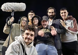 Javier Ruiz (pointing right into the camera), with the cast and crew behind him during the film's night shoot.