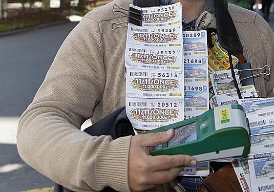File image of an ONCE lottery ticket seller.