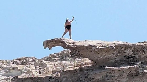 Seeking the ultimate selfie: up to 10 people an hour risking death on a protected dune