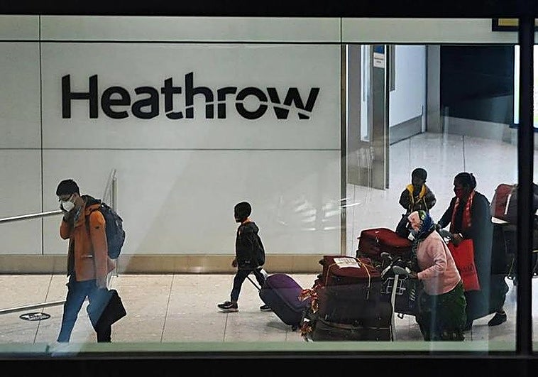 Passengers at London's Heathrow airport.