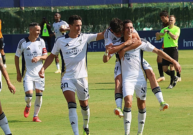 Marbella's Jorge Álvarez celebrates his equaliser.
