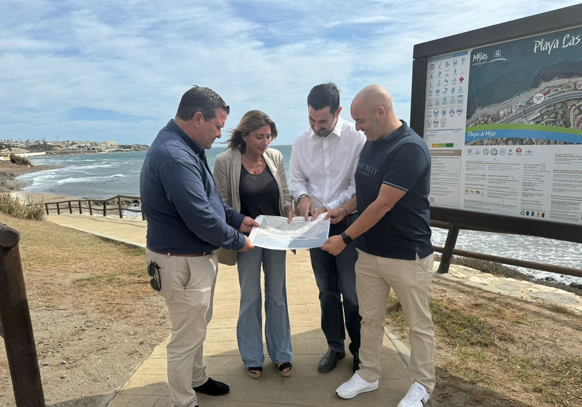 Ana Mata studies the plans for coastal path extension.