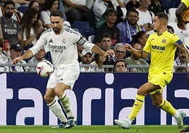 Dani Carvajal (l) seconds before the injury happened.