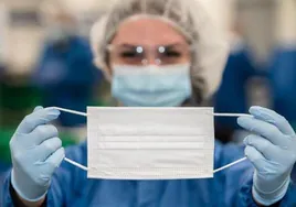 A health worker wearing a face mask.