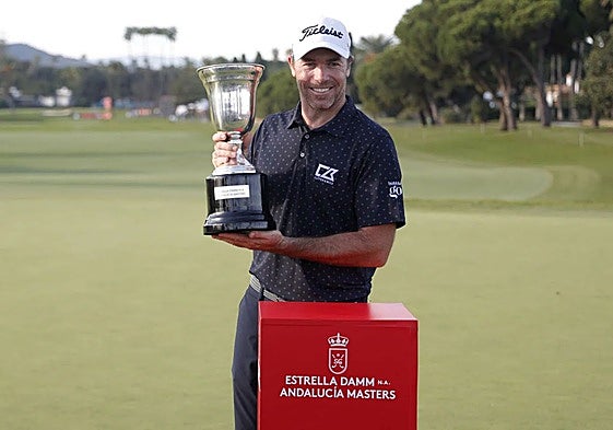 Guerrier holds the prestigious trophy.