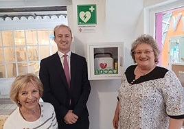 Pamela Lake, James Stirling and Carol Woolnoth with the new defibrillator.