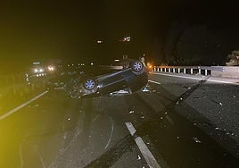 Car flips onto roof in middle A-7 Costa del Sol motorway but police find no trace of driver