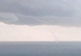 The waterspout, seen from Arroyo de la Miel this morning.