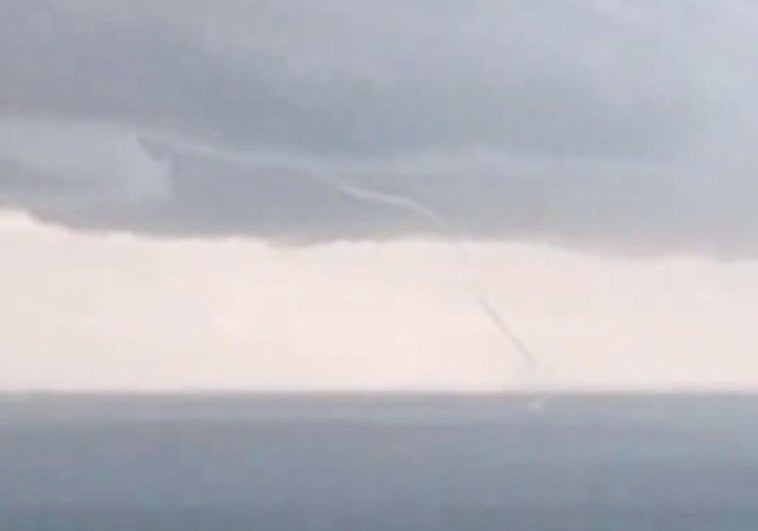 The waterspout, seen from Arroyo de la Miel this morning.