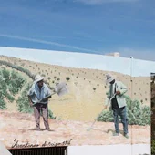 At the entrance to the village of Gibralgalia in Cártama there is a nod to agricultural work in the past.