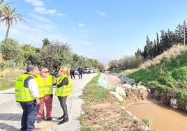 The mayor of Alhaurín de la Torre, with Carolina España, next to one of the sandboxes built to stop the flooding of the Blanquillo stream.