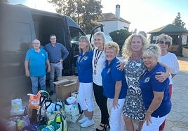 Lions and Rotary members with some the goods collected for Valencia.