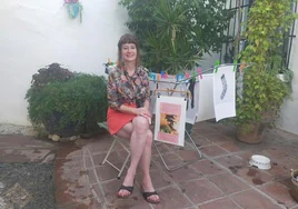 Anne Geene with her exhibition in Frigiliana.