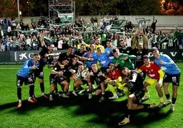 The Antequera players celebrate their victory.