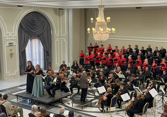 The choir and orchestra during a previous performance.