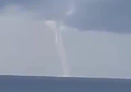 This is the moment an impressive waterspout whipped up the sea between two popular holiday resorts on the Costa del Sol