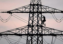 Archive image of a high-voltage pylon.