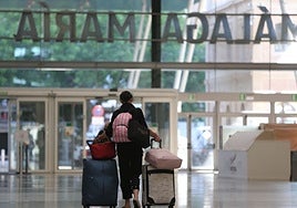 File image of tourist leaving María Zambrano railway station in Malaga.