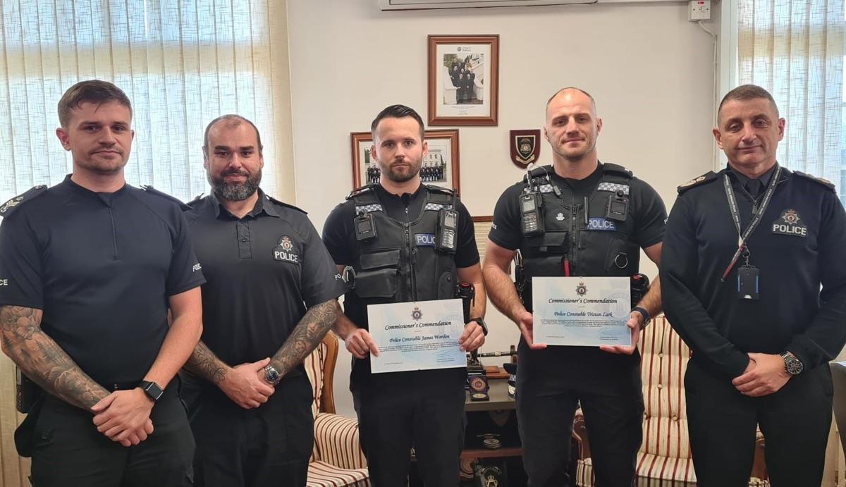 PCs Tristan Lark and James Warden were presented with the commendations by the Rock's Commissioner of Police Richard Ullger.