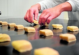 Making traditional 'mantecado'cakes at La Antequerana.