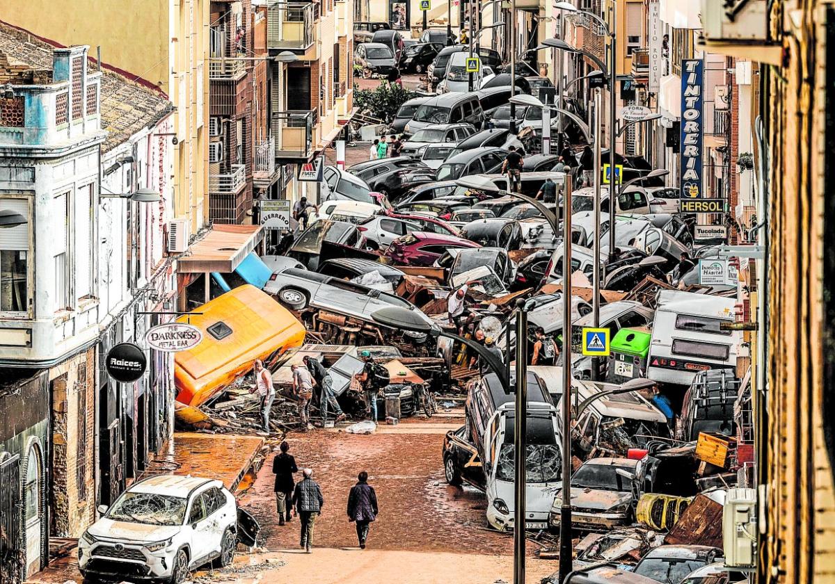 Cars piled up in Picaña, one of the towns near Valencia hit by the floods at the end of October.