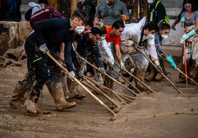 Cleaning up after the floods in Valencia.