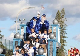 Melchior gives out sweets during last year's parade.