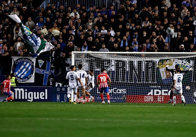 Griezmann, left, squeezed the ball in at the back post.