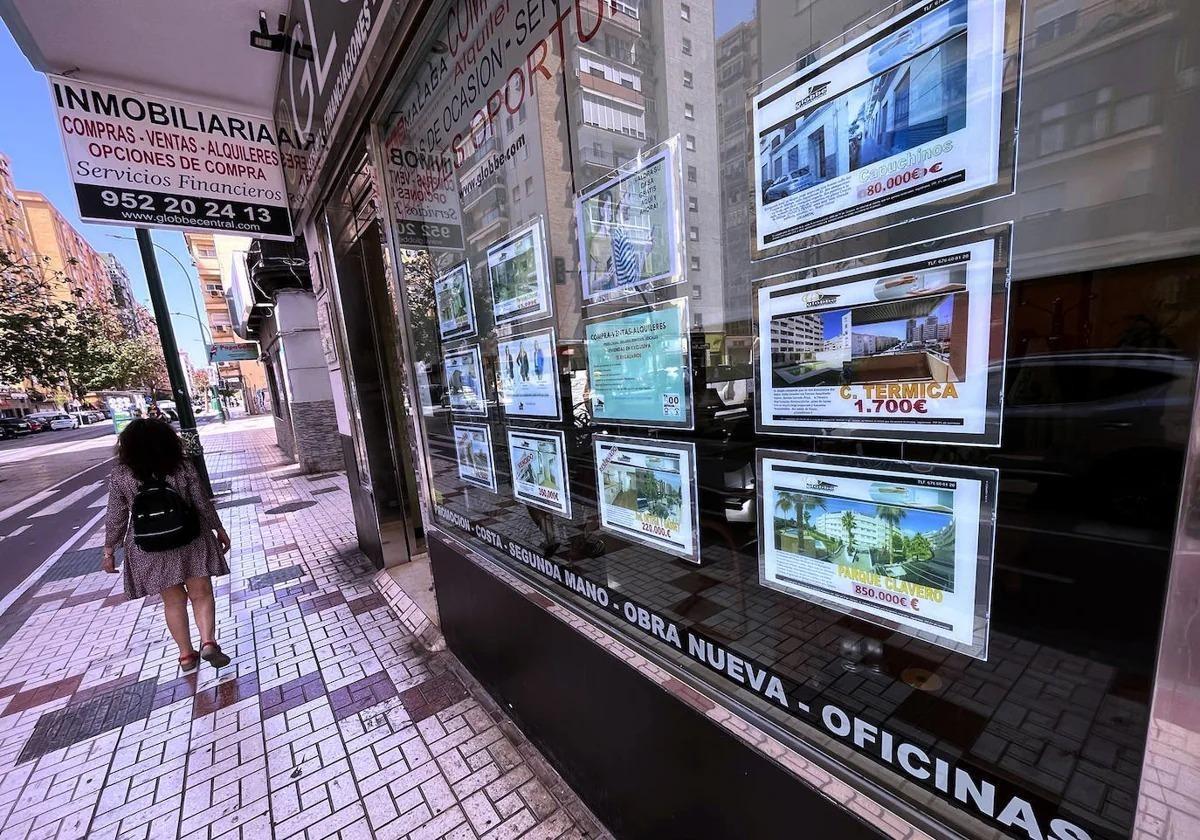 Shop window of a real estate agency on a street in Malaga