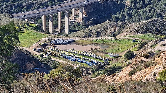Why have 2,000 rubbish containers been left on a hill near the A-7 motorway on the Costa del Sol?