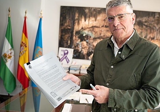 Photo of Armijo with the court decision.