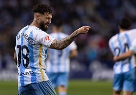 Malaga left-back Dani Sánchez celebrates scoring what turned out to be the winning goal.
