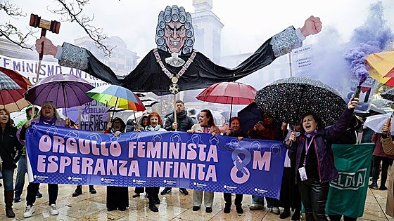 Three hundred people rally in Malaga despite heavy rain forcing suspension of International Women's Day protest