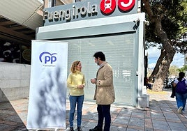 PP representatives in front of the entrance to the Cercanías station in the centre of Fuengirola.