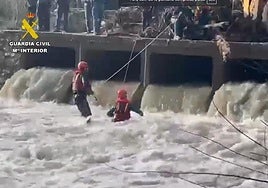 Police divers search for the missing motorcyclist.