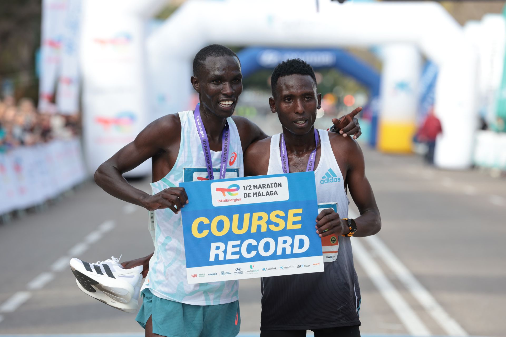 Mosin (l) and Kiprotich (r) both crossed the line in record times.