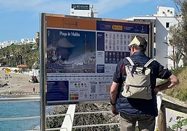 A visitor at one of the information panels.
