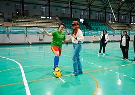 One of the participants attempts to score a goal blindfolded.