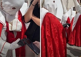 A Nazarene with the electronic payment machine in the Brotherhood of the Borriquilla procession in Guadix.