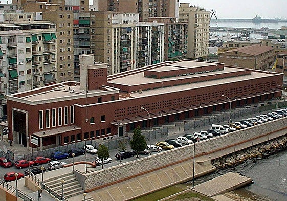 Archive image from 2002, when the building was restored with its original reddish hue, only to be painted white when inaugurated as CAC Malaga.