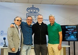 Romero (2l) during the presentation of the event.