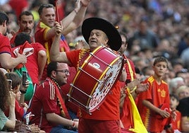 Manolo 'el del Bombo', drumming up support from fans during a Spanish national team match.