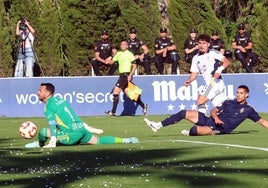 Marcos Olguín's scoring one of his goals.
