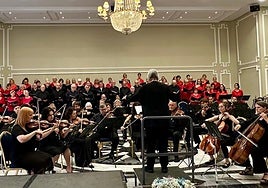 The choir and orchestra during a previous concert.