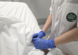 Image of one of the nurses at the Hospital Costa del Sol attending to a patient.