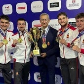 Balbuena, right, with the rest of the winning team.