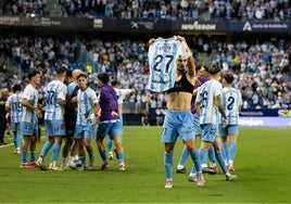 The young forward removed his shirt to celebrate his two goals.