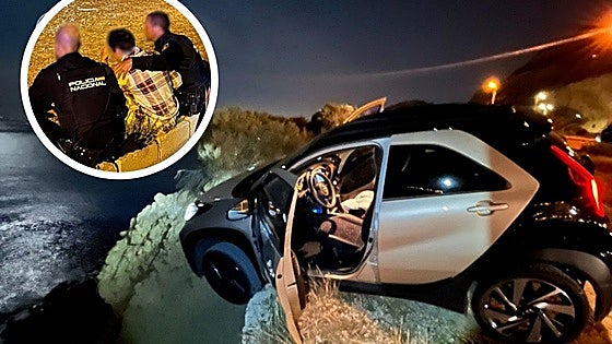 Two police officers save a woman from driving her car over a cliff in Alicante